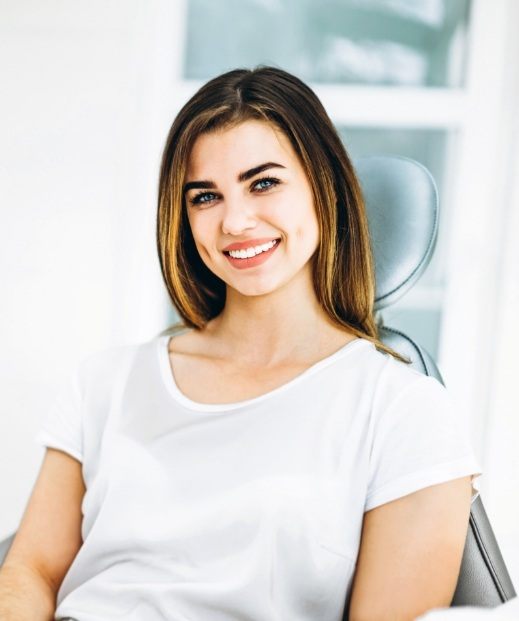 Young woman smiling while visiting Irving sleep center