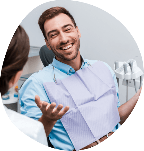 Bearded man laughing while visiting sleep center