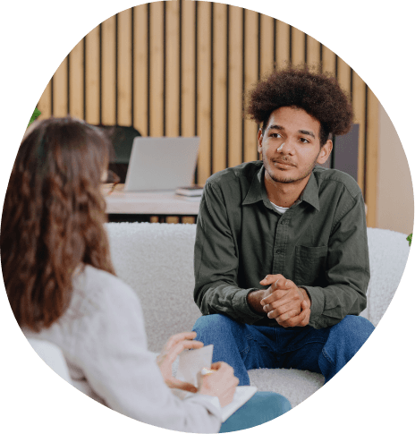 Young man talking to a counselor