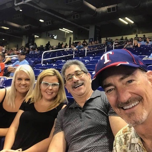 Doctor Smith at a Texas Rangers game with his family