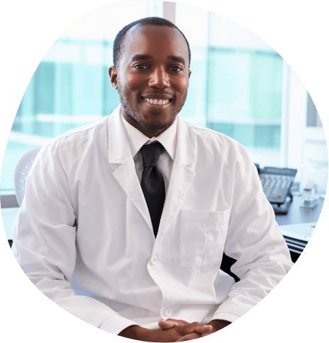 Smiling man in white lab coat