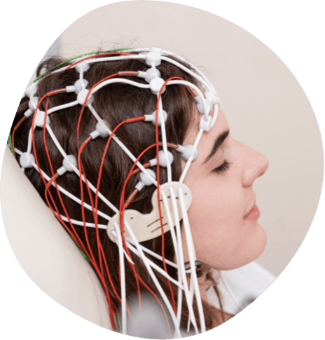 Young woman with electrodes on the top of her head for sleep testing