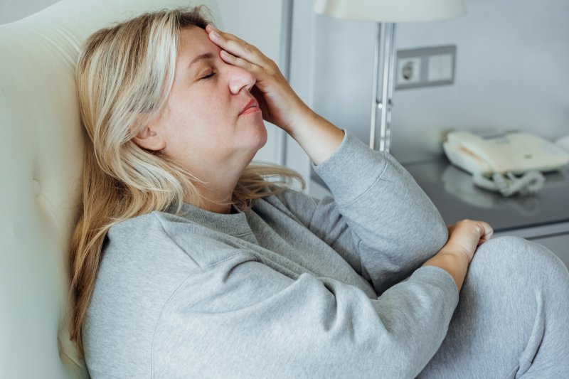 overweight woman experiencing fatigue