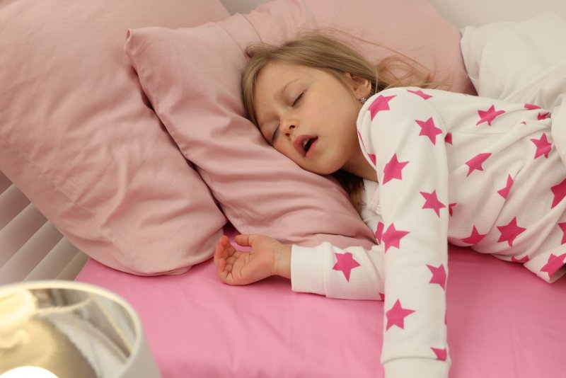 little girl asleep with her mouth open